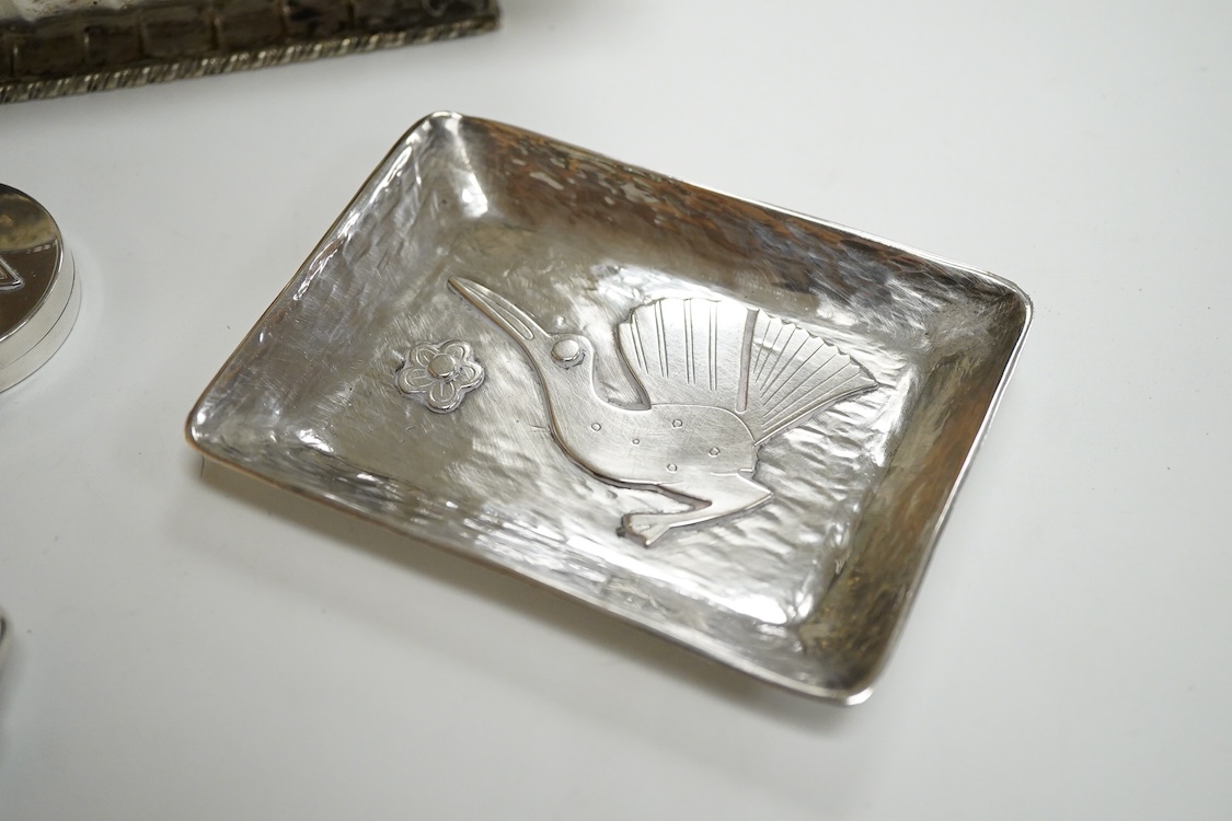 A continental 800 standard oblong shaped dish, of fluted design, together with a Peruvian sterling dish and similar pill box and a George V silver cigarette case, 16.6oz.